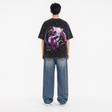 Model wearing the Origin Aura Vintage Tee, back view showing the purple aura graphic
