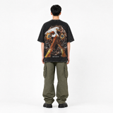 Model wearing the Ember Strike Vintage Tee, back view
