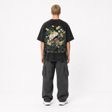 Model wearing the Golden Mischief Vintage Tee, back view