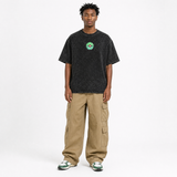 Model wearing the Verdant Bloom Vintage Tee, front view