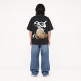 Model wearing the Lone Relic Vintage Tee, back view