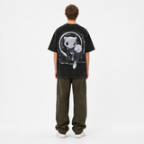 Model wearing the Astral Drift Vintage Tee, back view