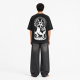 Model wearing the Void Dominion Vintage Tee, back view