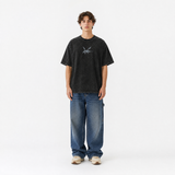 Model wearing the Onyx Ascension Vintage Tee, front view