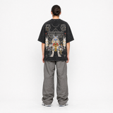 Model wearing the Temple Sentinel Vintage Tee, back view