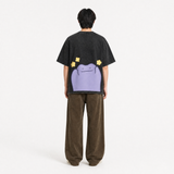 Model wearing the Soft Reset Vintage Tee, back view
